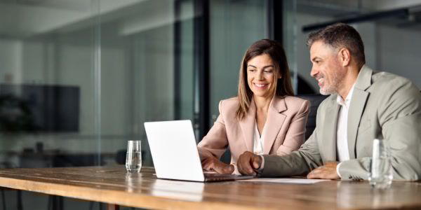 Man and woman at desk
